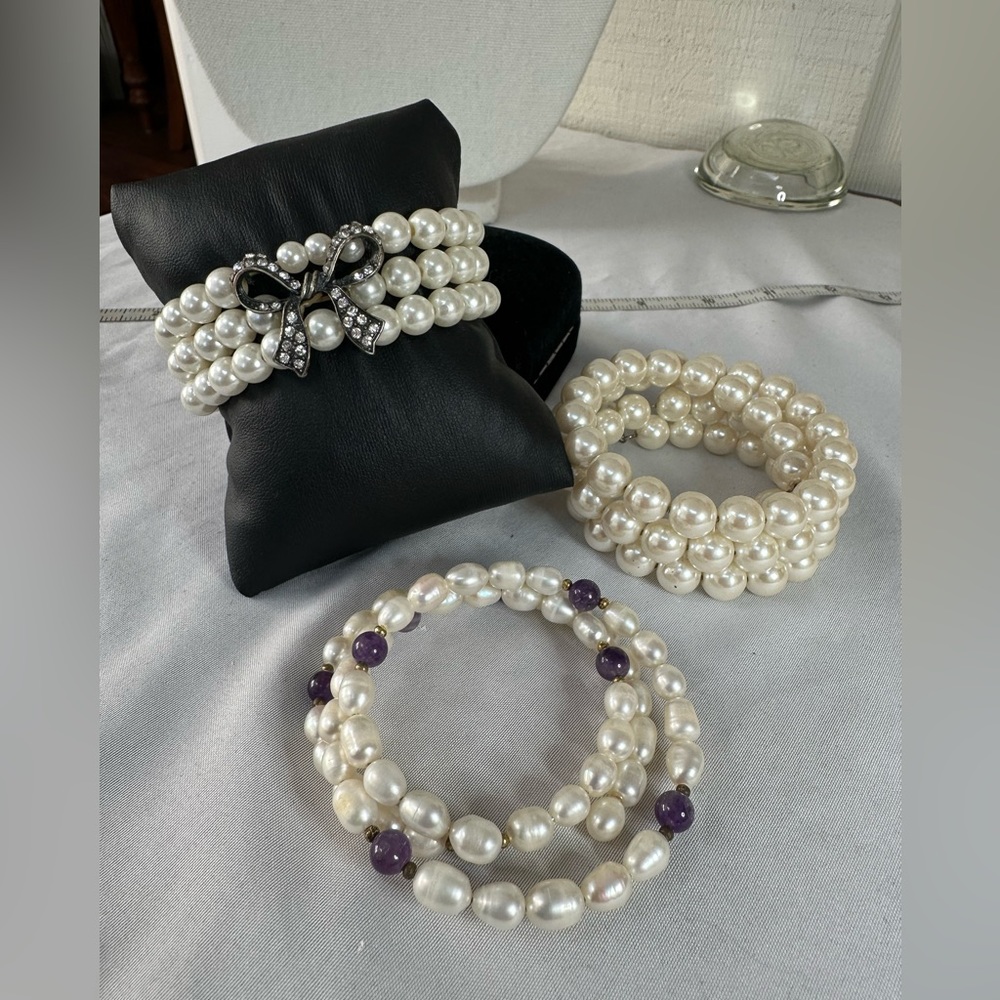 Three pearl bead bracelets coiled with amethyst and stretch